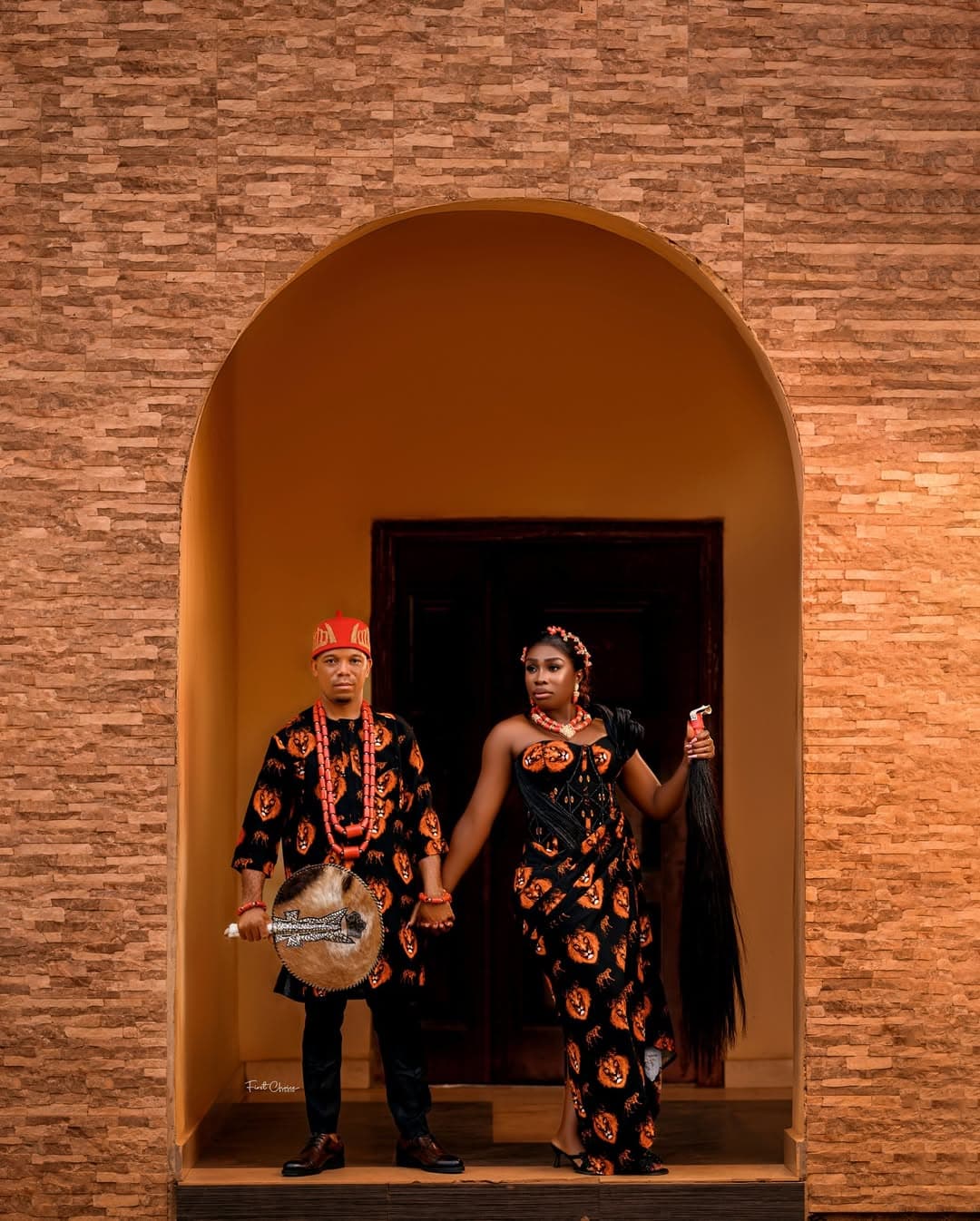 Couple in archway traditional wear