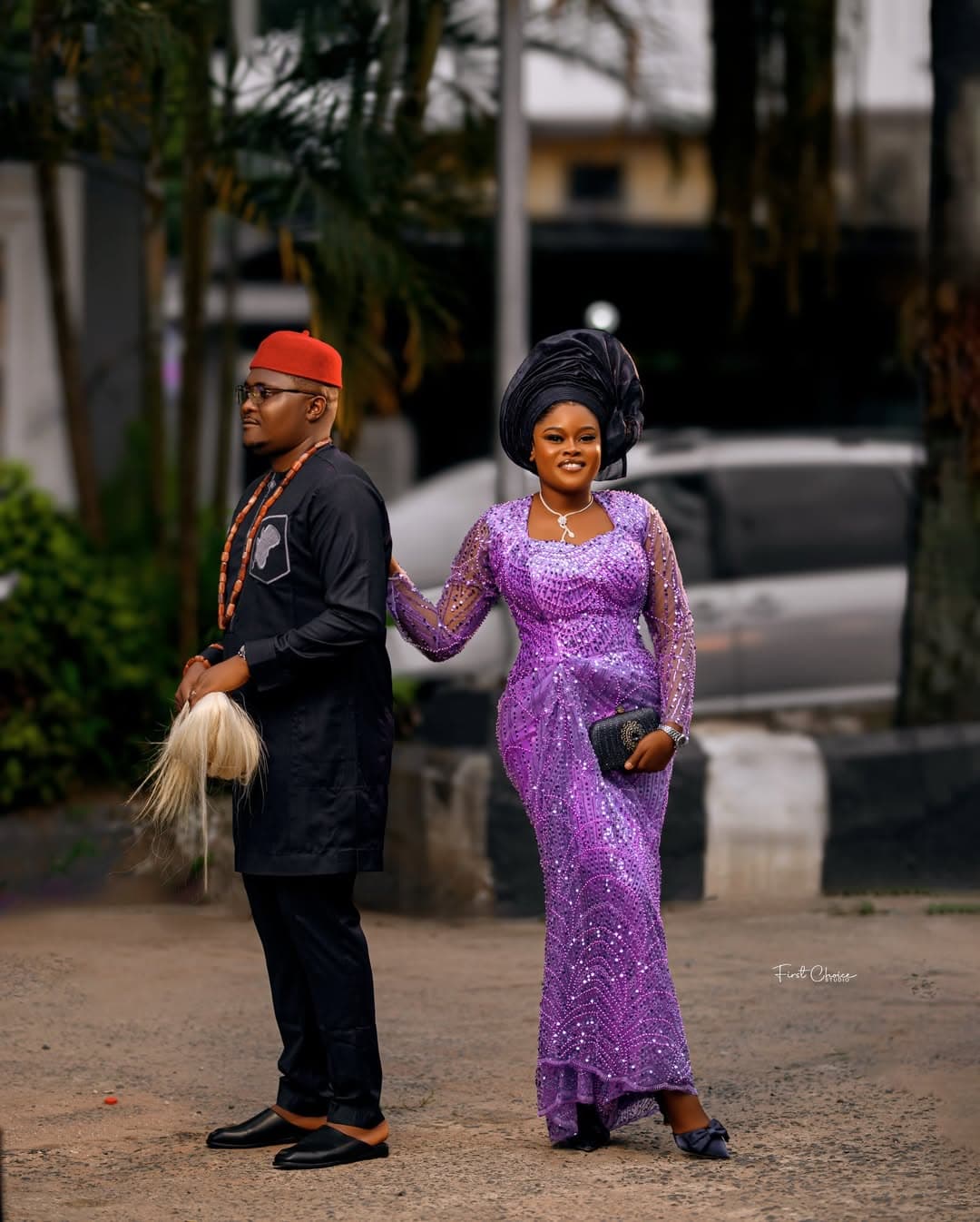 Elegant couple in purple and black attire